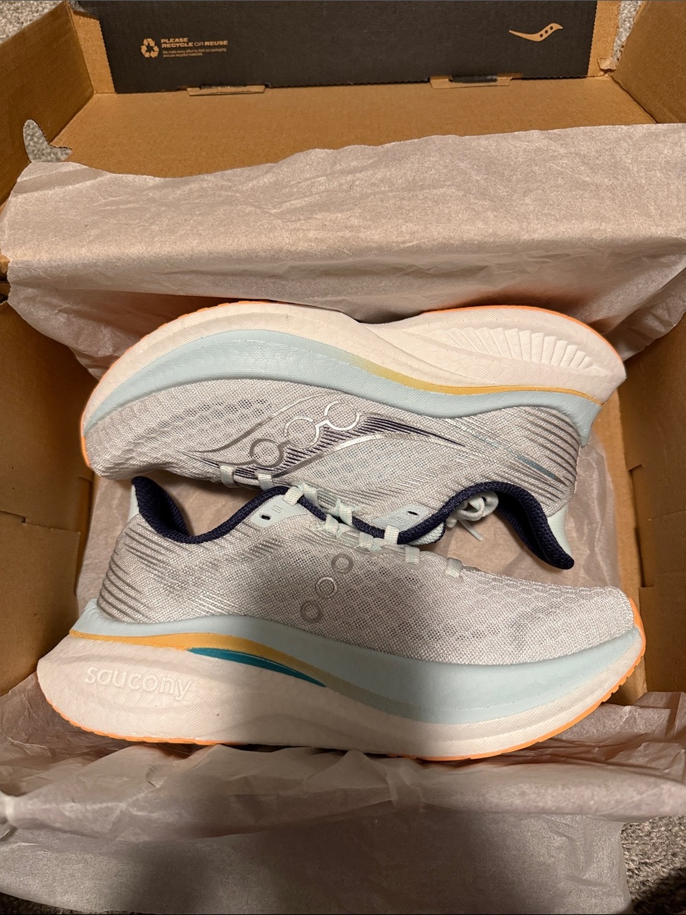 Saucony Women’s Light Gray Running Shoes with Navy and Orange Trim
